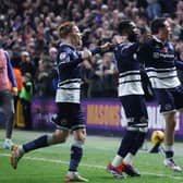 Tanganga celebrates scoring against Leeds United.