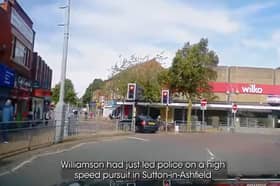 Dangerous driver narrowly avoids hitting woman with a pram.