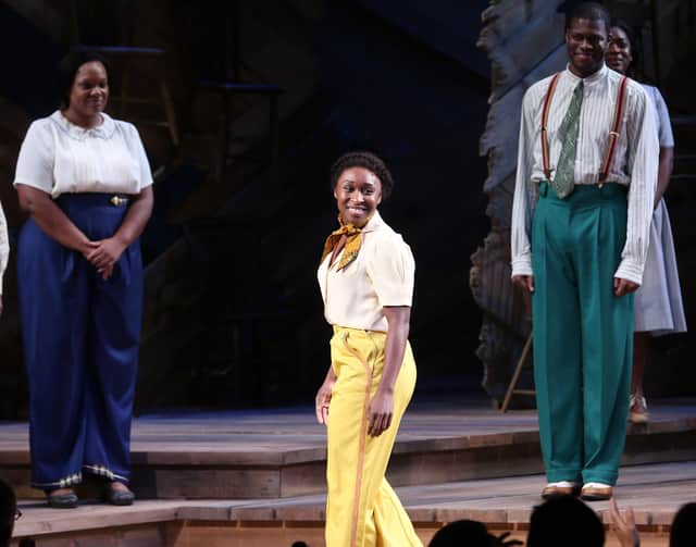 Actress Cynthia Erivo (C) takes a bow during curtain call following her debut performance in Broadway's "The Color Purple" at The Bernard B. Jacobs Theatre on November 10, 2015 in New York City.