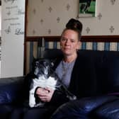 Trevvena Prince, pictured with her dog Bullet, had to move out as she feared a problem with her washing machine could set fire to the house