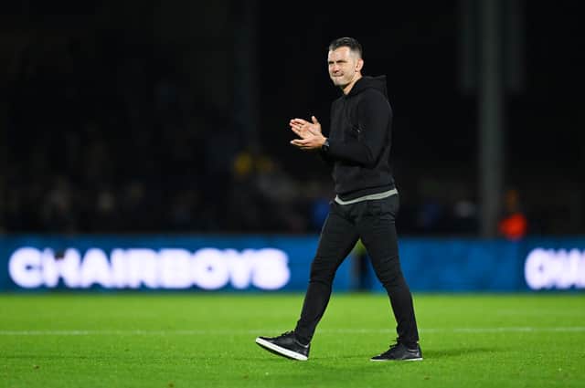 Matt Bloomfield has played down his side's title ambitions.