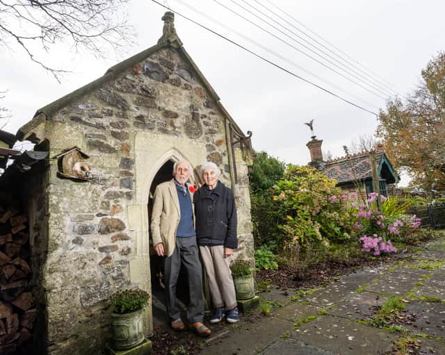 A couple who bought a cottage for £1K have turned it into the ultimate playground for their grandkids - including three life-size playhouses.