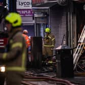 Firefighters tackle a blaze at a takeaway restaurant in North London