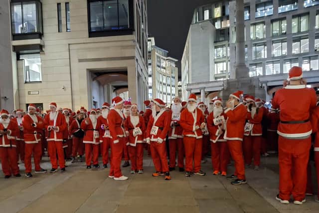 Thousands of runners donned their Santa suits for the London fun run