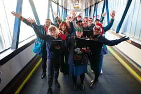 Carol singers take over Uk train station to spread important message