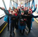 Carol singers take over Uk train station to spread important message