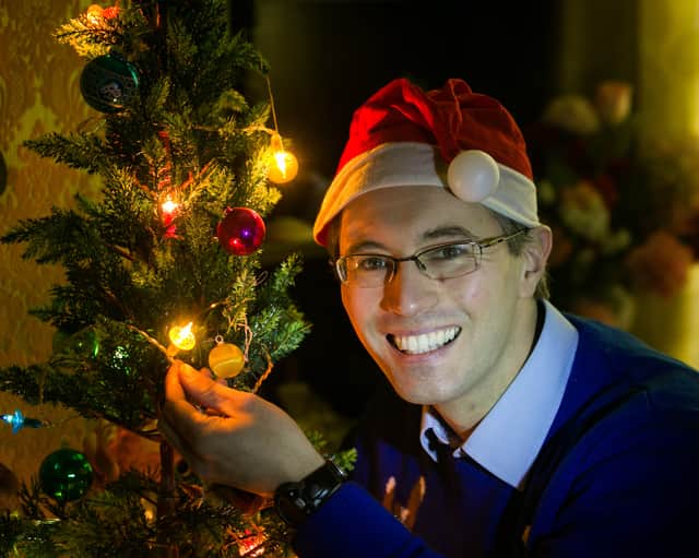 Ross Shaddick from Plymouth, Devon, with his Christmas lights which have finally blown after 54 years.