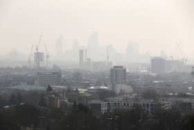 The City of London covered in smog seen from Hampstead Heath on April 10, 2015 in London