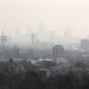 The City of London covered in smog seen from Hampstead Heath on April 10, 2015 in London