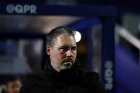 QPR head coach Marti Cifuentes in the dugout against Oxford United.
