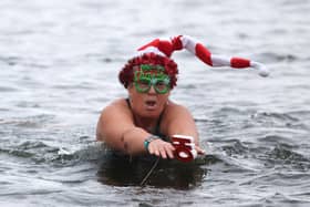 Swimmers take to the water for a Christmas Day swim