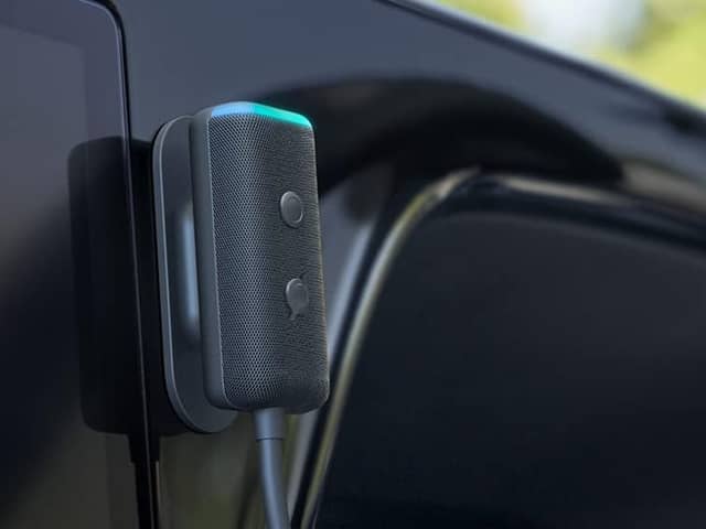 The Echo Auto sits discreetly on your dashboard, ready to take commands