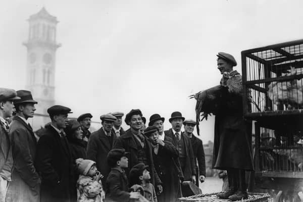 Crowds buying their Christmas turkeys at the Caledonian Market, London. 19th December 1924.