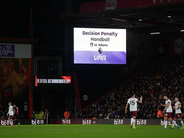 A VAR check takes place at the Vitality Stadium.
