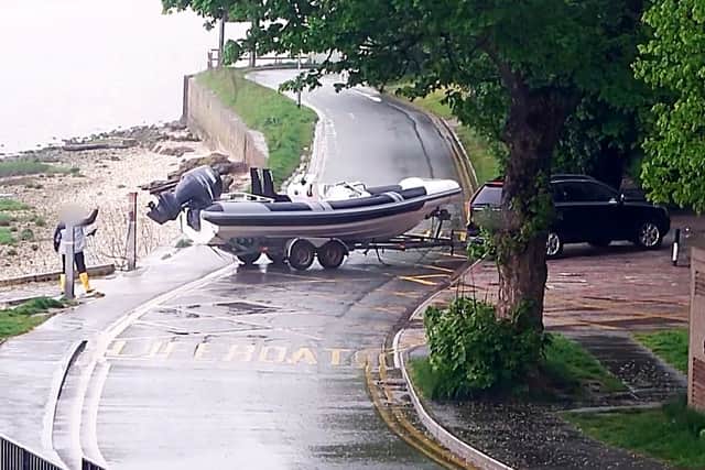 Preparing and launching the RHIB (rigid hulled inflatable boat), Humber Bridge, Hessel.