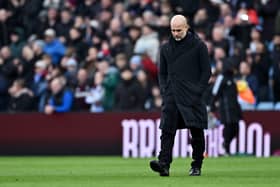 Pep Guardiola, Manager of Manchester City, shows dejection after defeat in the Premier League match between Aston Villa FC and Manchester City FC at Villa Park on December 21