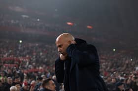Arne Slot, head coach of Liverpool, looks down during the Premier League match between Liverpool FC and Leicester City FC at Anfield