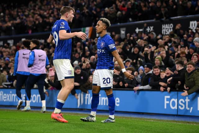 Omari Hutchinson of Ipswich Town celebrates with teammate Liam Delap after scoring his team's second goal during the Premier League match between Ipswich Town FC and Chelsea FC at Portman Road on December 30, 2024