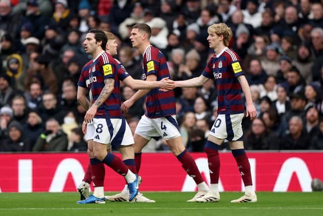 Anthony Gordon celebrates scoring against Spurs.
