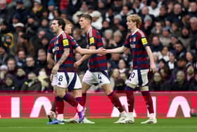 Anthony Gordon celebrates scoring against Spurs.