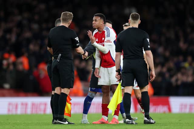 Gabriel of Arsenal confronts Referee Craig Pawson after the Premier League match between Arsenal FC and Everton FC at Emirates Stadium on December 14, 2024 in London, England.