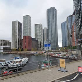 A view of the existing 7 Brannan Street site, seen from across the Blackwall Basin at Trafalgar Way