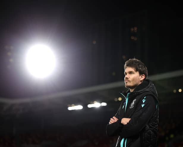 Danny Rohl, Manager of Sheffield Wednesday inspects the pitch prior to the Carabao Cup Fourth Round match between Brentford and Sheffield Wednesday at Gtech Community Stadium on October 29, 2024 in Brentford, England. 