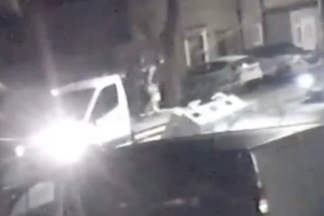 Footage shows the moment a kebab shop fridge is fly-tipped on a residential street in Dagenham, East London, during the late hours of the night on January 7, 2025.