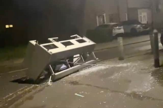 Kebab shop fridge is fly-tipped on a residential street in Dagenham, East London, during the late hours of the night on January 7, 2025.