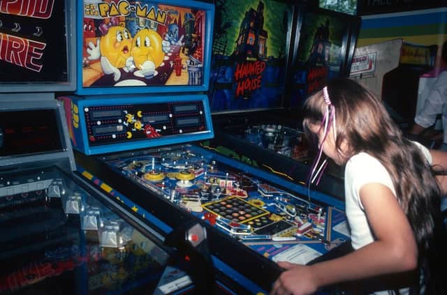 Items for sale in London include a vintage Pac Man machine