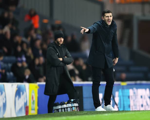 John Mousinho, Head Coach of Portsmouth, reacts during the Sky Bet Championship match between Blackburn Rovers FC and Portsmouth at Ewood Park on January 15, 2025 in Blackburn, England. 