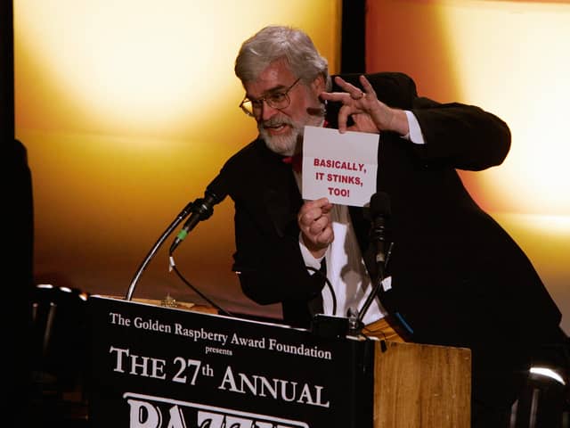 Presenter John Wilson announces the winner for  "Worst Picture",  "Basic Instinct 2" announced as "Basically it Stinks Too" during the Razzie Awards in Hollywood, CA, 24 February 2007.