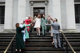Sam and Christopher Jamieson-Green are pictured leaving Old Marylebone Town Hall after getting married on October 1, 2024