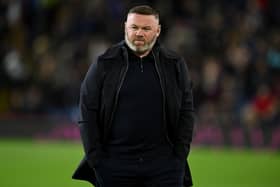 Rooney is trying to help the Manchester United forward.