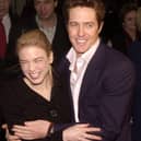 Actress Renee Zellweger hugs actor Hugh Grant at the premiere of "Bridget Jones's Diary" April 2, 2001 in New York City.