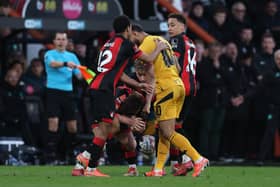 Matheus Cunha of Wolverhampton Wanderers clashes with Milos Kerkez of AFC Bournemouth, resulting in a red card being awarded during the Emirates FA Cup Fifth Round match between AFC Bournemouth and Wolverhampton Wanderers at Vitality Stadium on March 01, 2025 in Bournemouth, England.