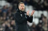 Graham Potter, Manager of West Ham United,  claps during the Premier League match between West Ham United FC and Leicester City FC at London Stadium on February 27, 2025 in London, England. 