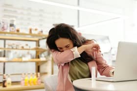 Hay fever symptoms include sneezing, a runny nose and itchy eyes.