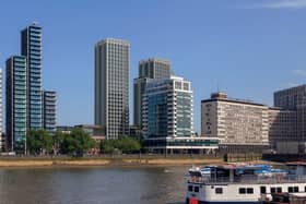 Concept art of the proposed 29-storey tower in the centre of the image, with the shorter tower partly obscured by an existing white building