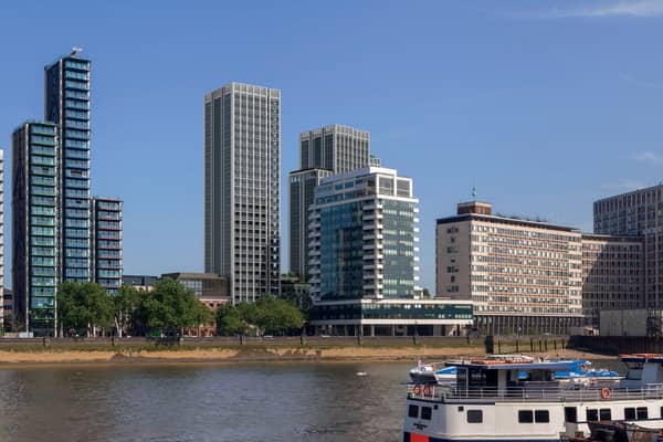Concept art of the proposed 29-storey tower in the centre of the image, with the shorter tower partly obscured by an existing white building