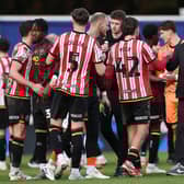 Chris Wilder, Sheffield United manager shakes hands with his players  after the final whistle in the Sky Bet Championship match between Queens Park Rangers FC and Sheffield United FC at Loftus Road on March 01, 2025 in London, England. 