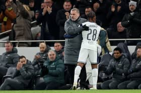 Ange Postecoglou, Manager of Tottenham Hotspur, embraces with goalscorer Wilson Odobert during the UEFA Europa League 2024/25 Round of 16 Second Leg match between Tottenham Hotspur and AZ Alkmaar at Tottenham Hotspur Stadium on March 13, 2025 in London, England.