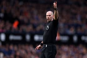 Tim Robinson is in charge at Loftus Road this weekend.