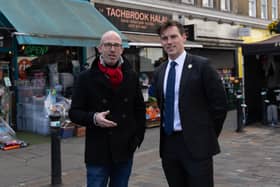 Councillors Geoff Barraclough (L) and Ed Pitt Ford standing at the site in Tachbrook Market, Pimlico, where they saved a man's life through CPR