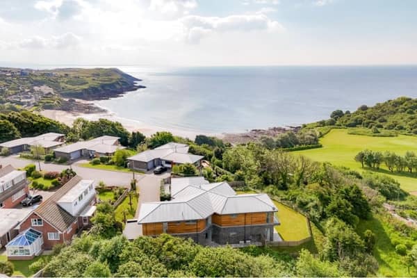 The Gower Peninsula in Swansea is one of the best places to live in the UK, according to the Sunday Times. This fabulous four-bedroom house looks out over Langland Bay, with its lovely sunny beach, and the nearby golf course.