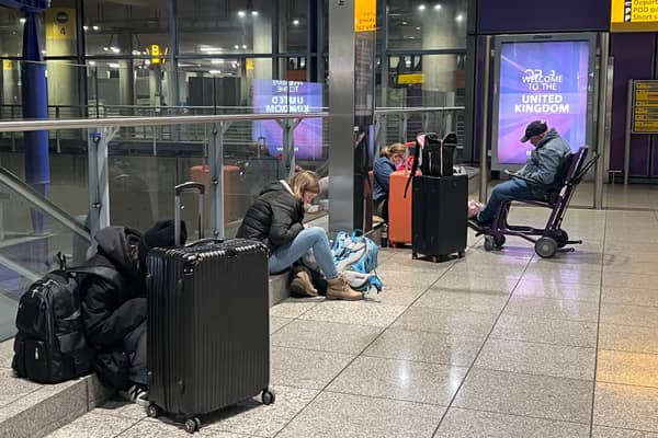 Stranded passengers at Heathrow Terminal 5 in London