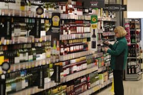 A member of staff scans groceries inside Rochdale's Morrisons supermarket in 2017 (Photo: Christopher Furlong/Getty Images)