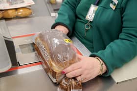 A member of staff scans groceries inside Rochdale's Morrisons supermarket in 2017 (Photo: Christopher Furlong/Getty Images)