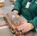 A member of staff scans groceries inside Rochdale's Morrisons supermarket in 2017 (Photo: Christopher Furlong/Getty Images)