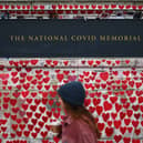 The National Covid Memorial War on the embankment on the south side of the River Thames